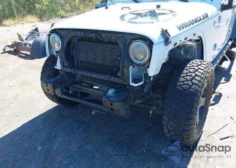 2016 Jeep Wrangler Unlimited Black Bear из США, поврежденный, VIN 1C4BJWDG1GL134329